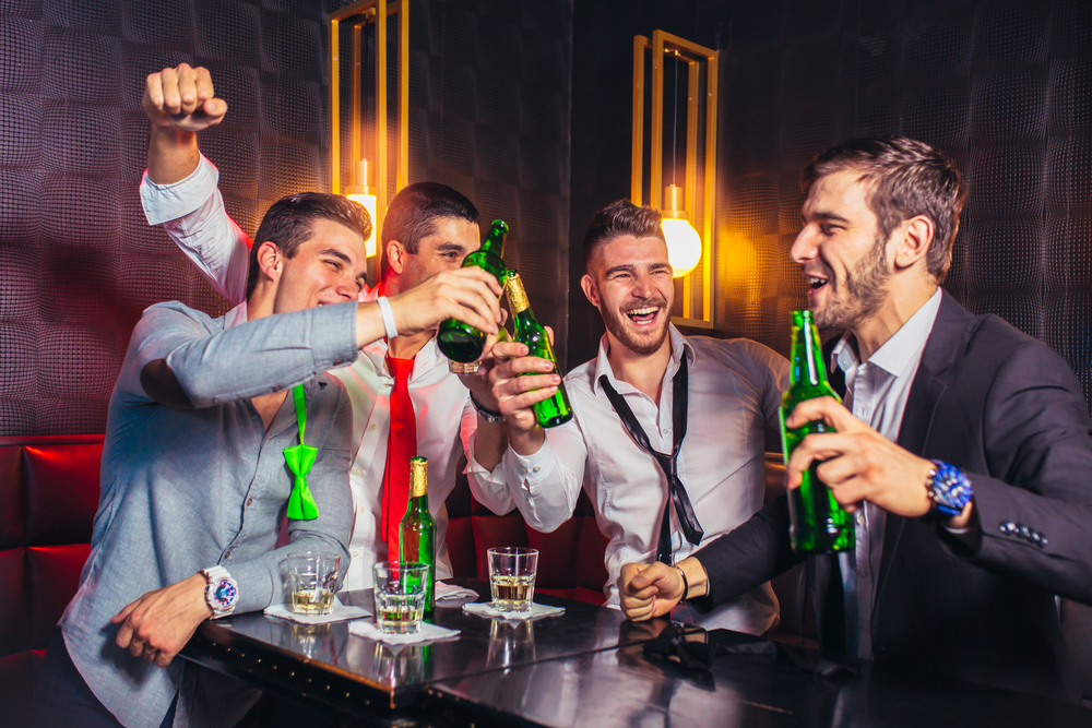 Group of young men on stag toasting at Garavogue nightclub