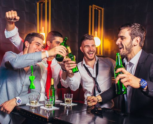 Group of young men on stag toasting at Garavogue nightclub