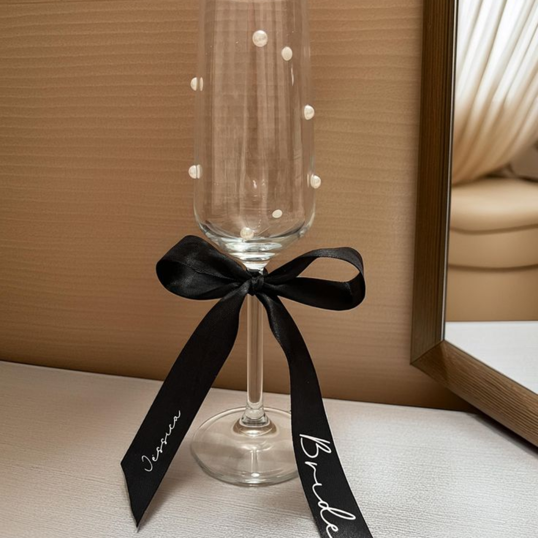 bows and pearls hen do (7) champagne bows and pearls Luxury Hen Party White Pearls Black Bows