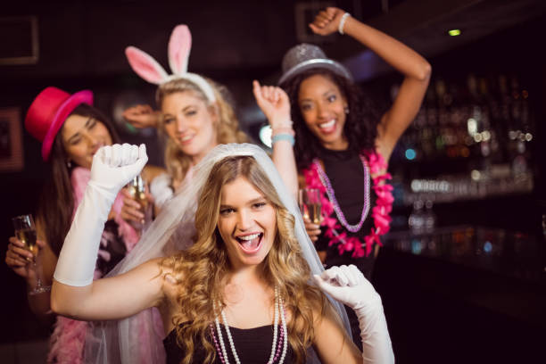 Friends celebrating bachelorette party in a nightclub Friends celebrating bachelorette party in a nightclub